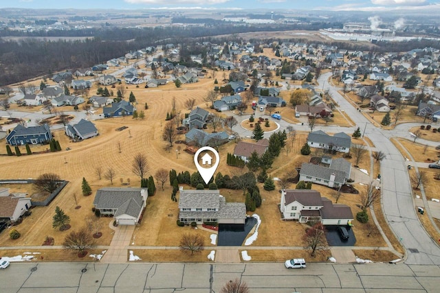 birds eye view of property with a residential view