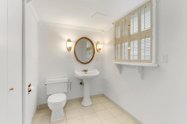 442 Forest Dr, Fontana, WI 53125 - half bath with ornamental molding, toilet, baseboards, and tile patterned flooring