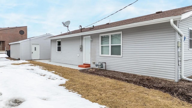 back of property with entry steps