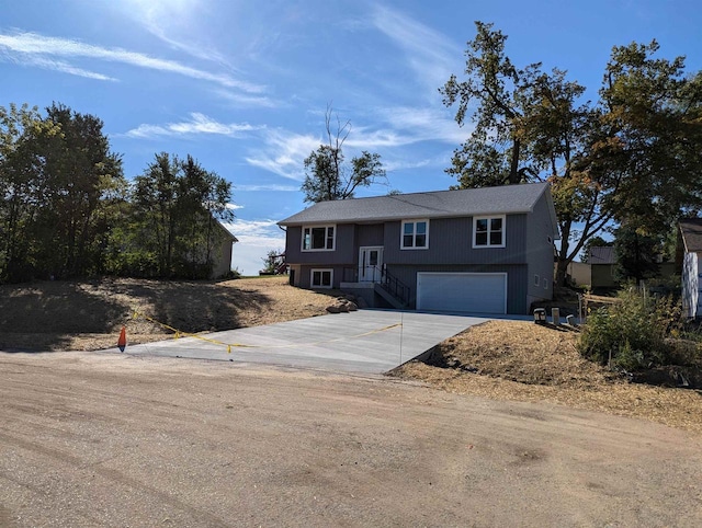 E11617 Pen-Marc Ct, Baraboo, WI 53913 - split foyer home featuring driveway and an attached garage