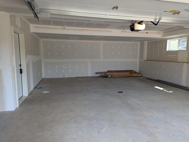 E11617 Pen-Marc Ct, Baraboo, WI 53913 - garage featuring a garage door opener