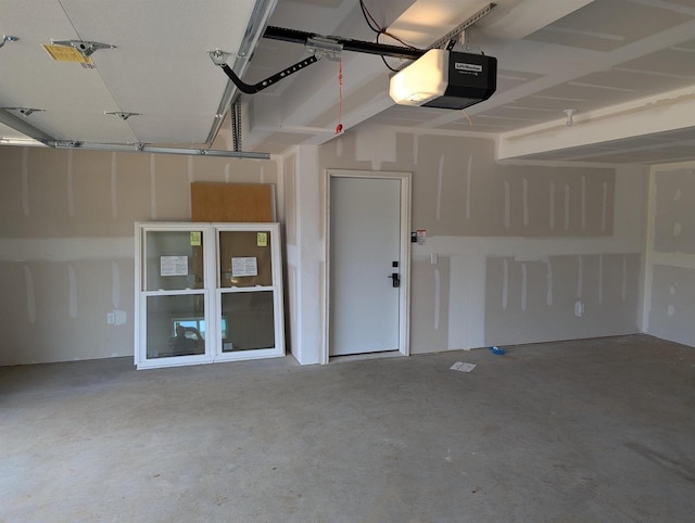 E11617 Pen-Marc Ct, Baraboo, WI 53913 - garage featuring a garage door opener