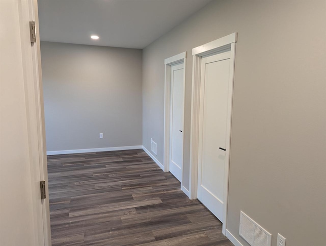 E11617 Pen-Marc Ct, Baraboo, WI 53913 - interior space featuring dark wood-type flooring, recessed lighting, visible vents, and baseboards