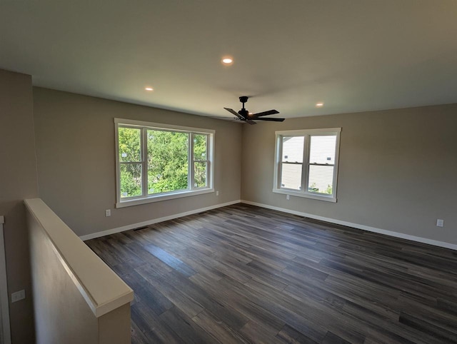 E11617 Pen-Marc Ct, Baraboo, WI 53913 - empty room featuring dark wood-style floors, baseboards, and recessed lighting