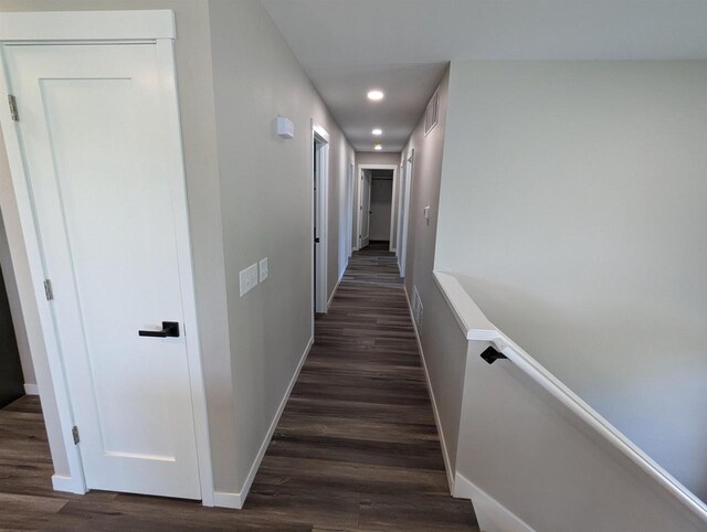 E11617 Pen-Marc Ct, Baraboo, WI 53913 - hall with visible vents, baseboards, dark wood-type flooring, an upstairs landing, and recessed lighting