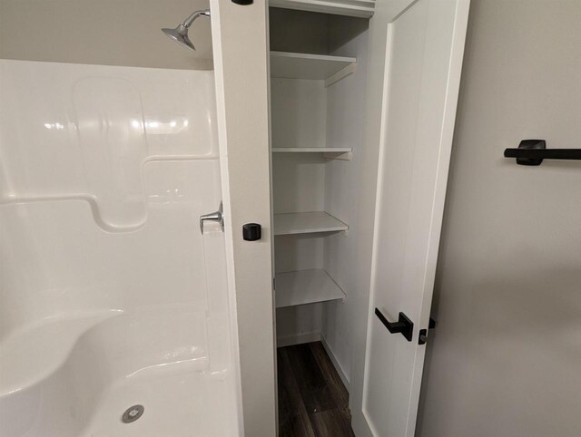 E11617 Pen-Marc Ct, Baraboo, WI 53913 - full bathroom with wood finished floors and walk in shower