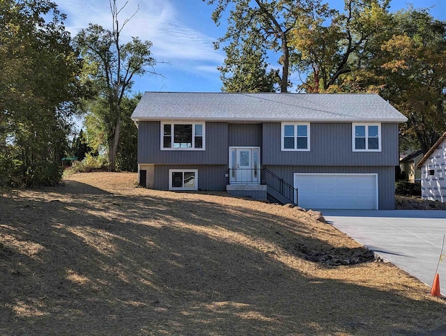 E11617 Pen-Marc Ct, Baraboo, WI 53913 - raised ranch with a garage and concrete driveway