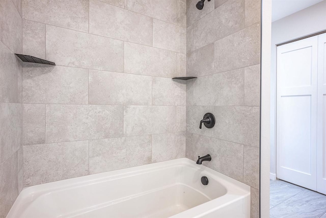 bathroom with shower / tub combination