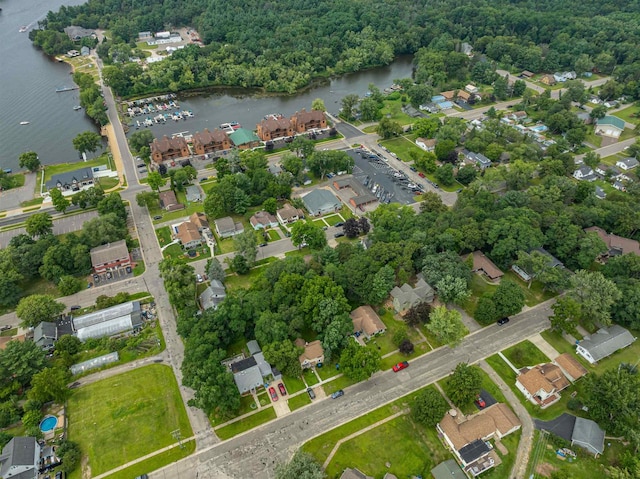 bird's eye view with a water view and a residential view