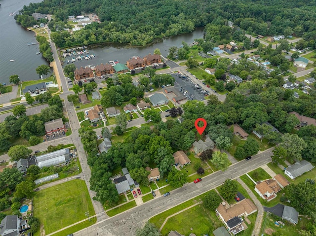 aerial view with a residential view and a water view