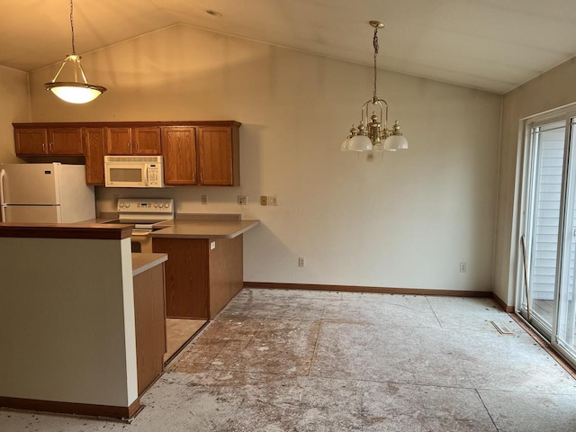 kitchen featuring white appliances, baseboards, brown cabinetry, hanging light fixtures, and a notable chandelier