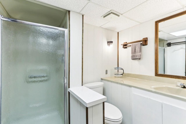 full bathroom featuring visible vents, vanity, toilet, and a shower stall