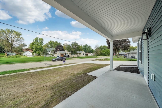 view of yard featuring a residential view