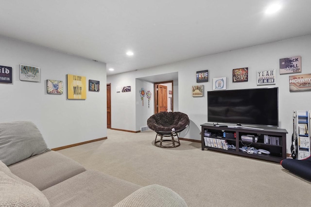 living room featuring carpet floors, recessed lighting, visible vents, and baseboards