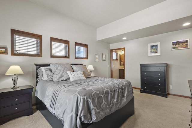 bedroom featuring recessed lighting, light colored carpet, and baseboards