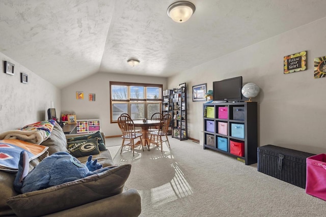 carpeted living room with lofted ceiling, a textured ceiling, and baseboards