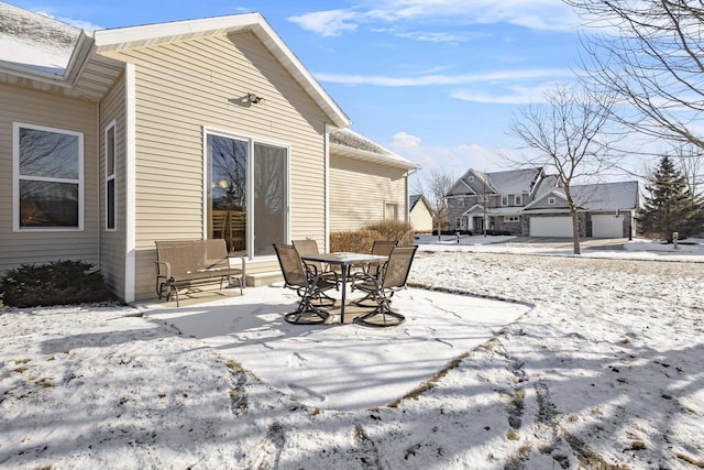 view of snow covered patio