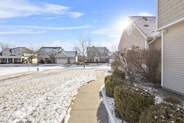 view of road featuring a residential view and sidewalks