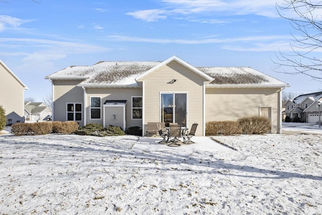 view of snow covered house