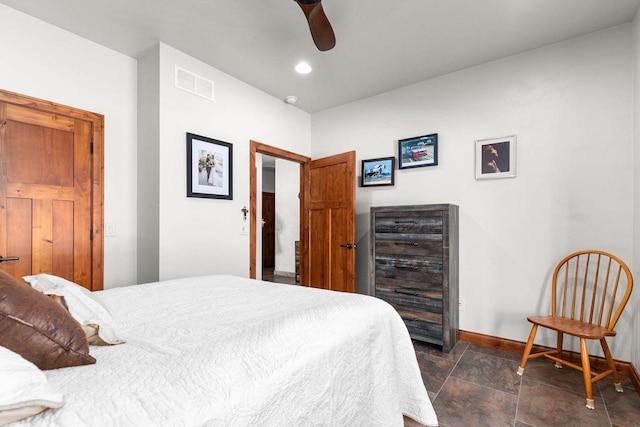 bedroom with recessed lighting, a ceiling fan, visible vents, baseboards, and stone finish floor