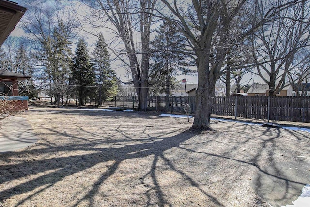 view of yard featuring fence