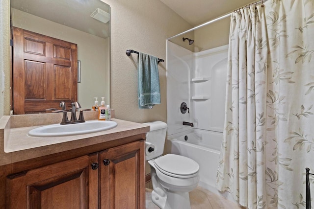 bathroom with a textured wall, toilet, shower / tub combo, vanity, and tile patterned floors