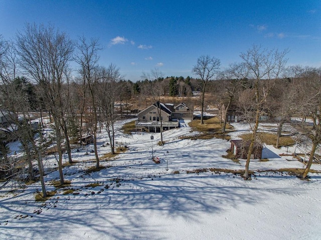 view of yard covered in snow