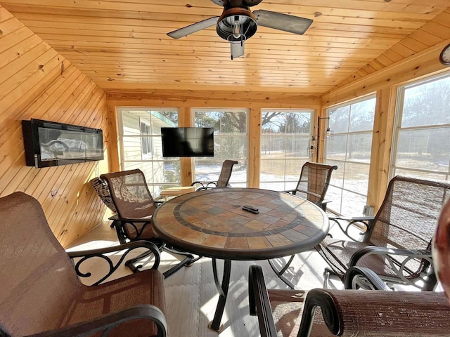 N9379 22nd Ave, Necedah, WI 54646 - dining room featuring lofted ceiling, a ceiling fan, wood finished floors, wooden ceiling, and wooden walls