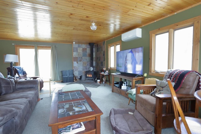 living area with an AC wall unit, wooden ceiling, a wood stove, and carpet flooring