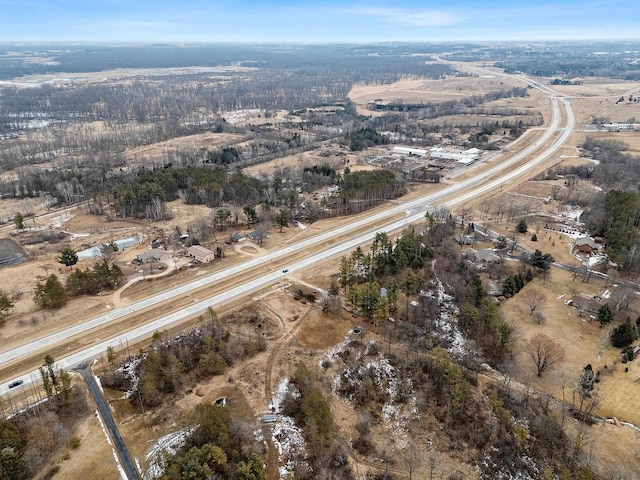 birds eye view of property with a rural view