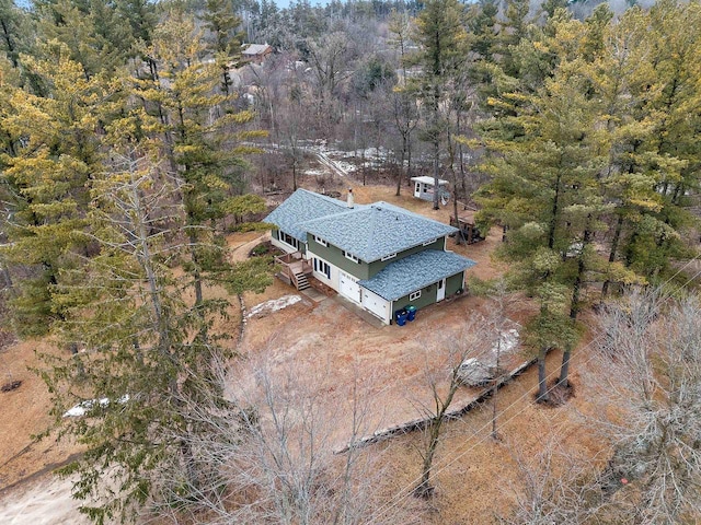 drone / aerial view with a view of trees