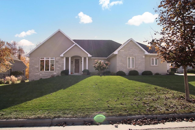 single story home featuring stone siding, stucco siding, and a front yard