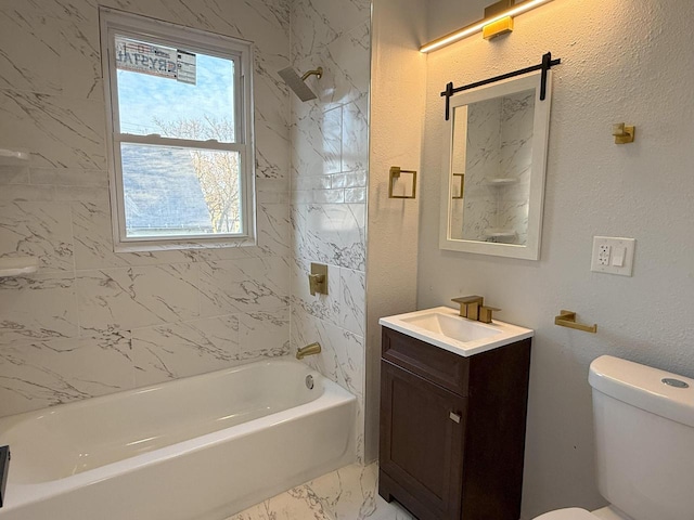 bathroom featuring marble finish floor, shower / bathtub combination, a textured wall, toilet, and vanity