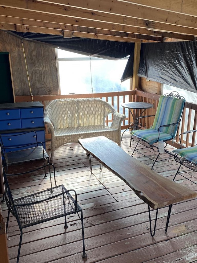 unfurnished sunroom with plenty of natural light