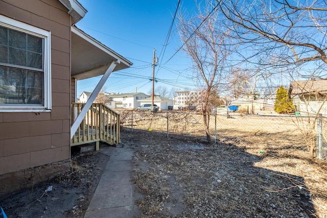 view of yard featuring fence