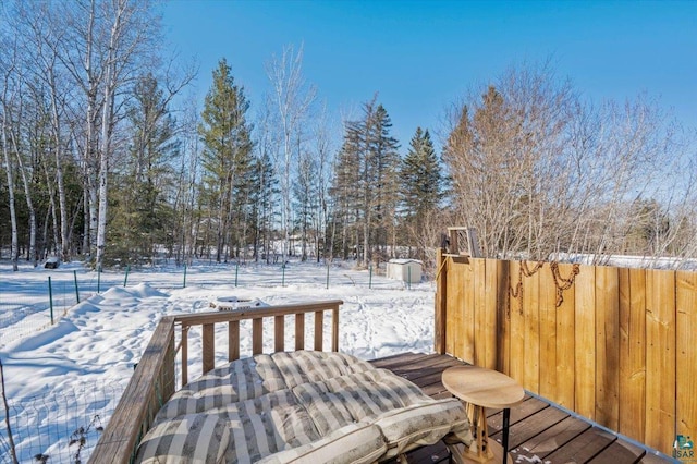 view of snow covered deck