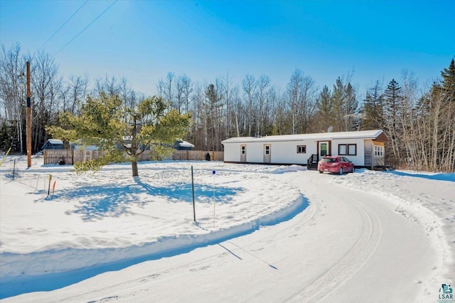 view of snow covered pool