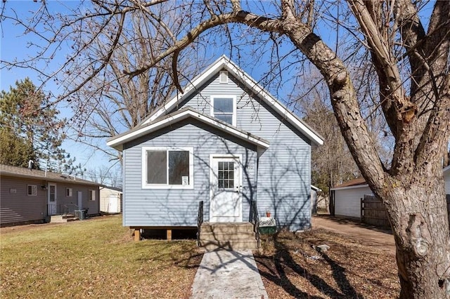 bungalow with a front yard