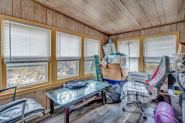 sunroom with vaulted ceiling and wooden ceiling