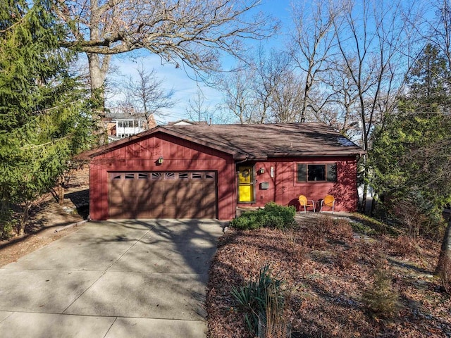 exterior space with concrete driveway