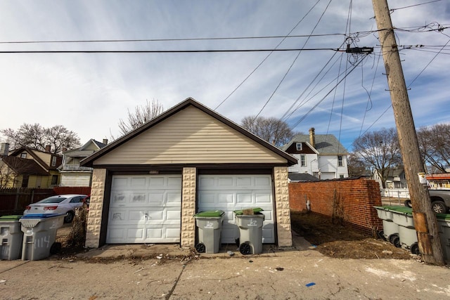 detached garage with fence