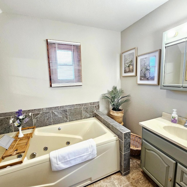 N3820 Fairwood Rd, Reeseville, WI 53579 - bathroom with a tub with jets, vanity, and tile patterned flooring