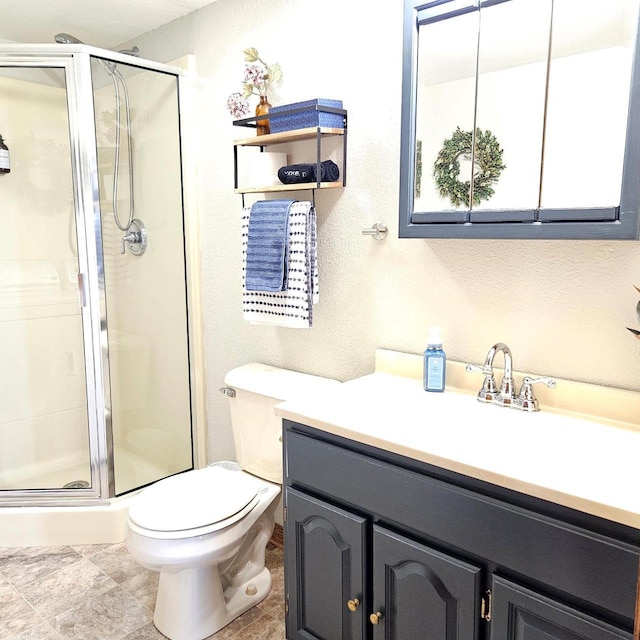 N3820 Fairwood Rd, Reeseville, WI 53579 - full bathroom with a shower stall, vanity, a textured wall, and toilet