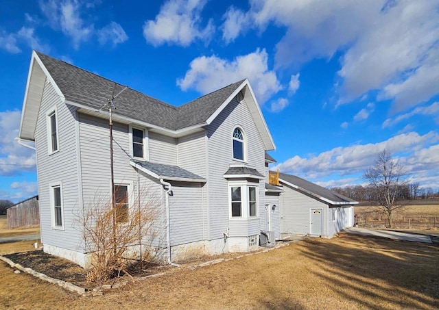 N3820 Fairwood Rd, Reeseville, WI 53579 - view of side of property featuring roof with shingles