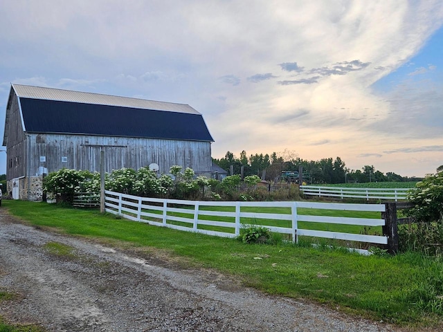 N3820 Fairwood Rd, Reeseville, WI 53579 - gate featuring a barn and an outdoor structure