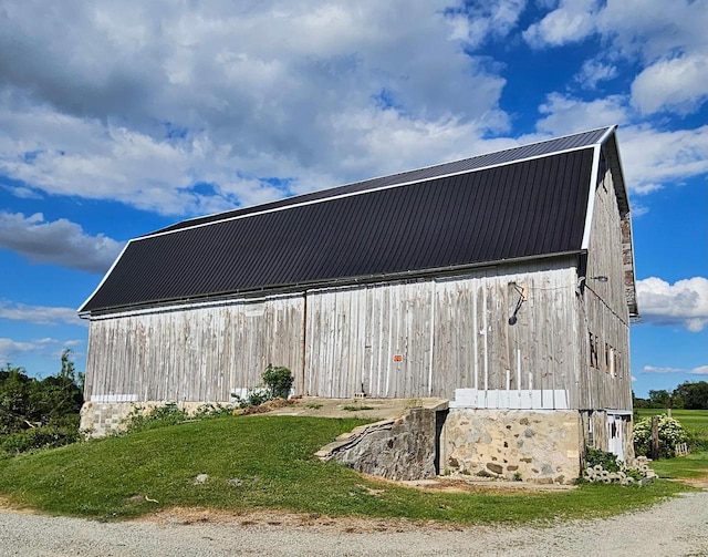 N3820 Fairwood Rd, Reeseville, WI 53579 - view of barn featuring a yard