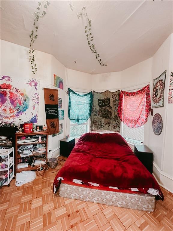 bedroom with baseboards