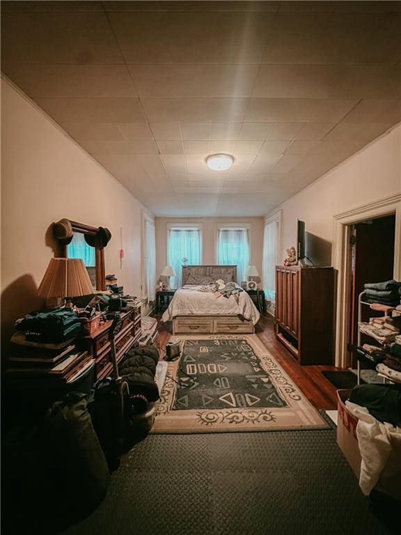 bedroom with wood finished floors