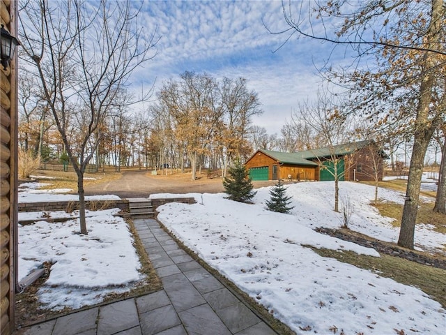 view of yard covered in snow