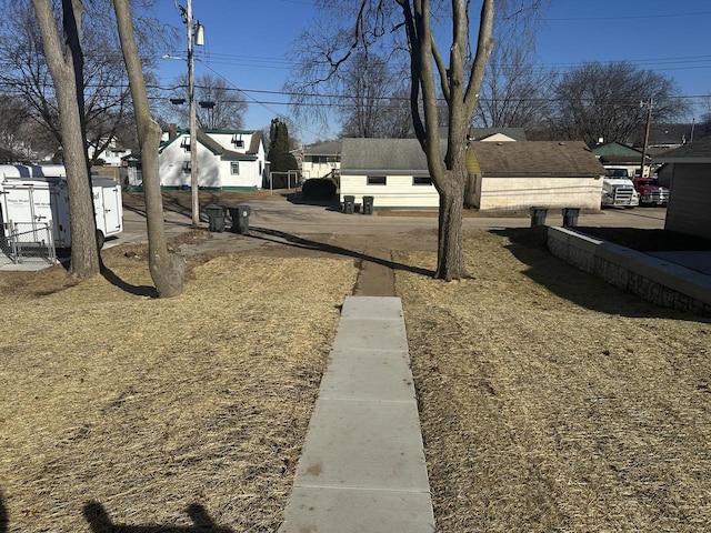 view of yard with a residential view